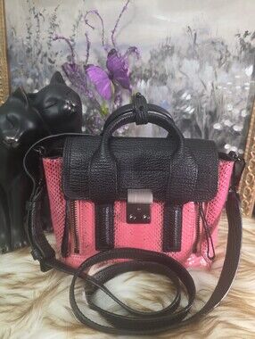 3.1 Phillip Lim Mini Pashli satchel in pink textured snakeskin leather.